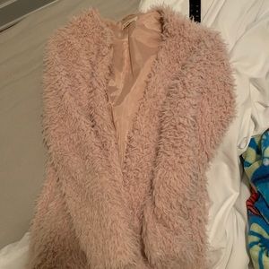 Pink, oversized faux fur coat